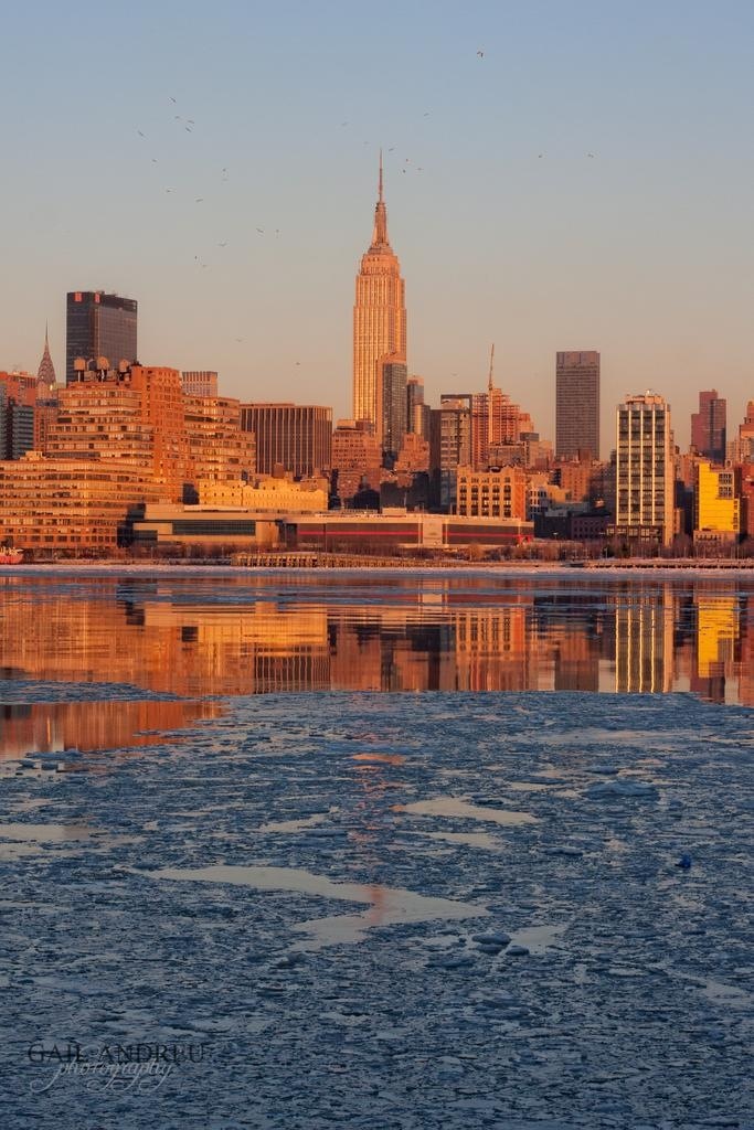 Nyc by day surrounded by icy waters