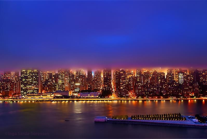 Low clouds blocking out tall buildings in manhattan