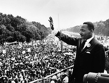 Martin_Luther_King_Jr._addresses_a_crowd_from_the_steps_of_the_Lincoln_Memorial,_USMC-09611.jpg